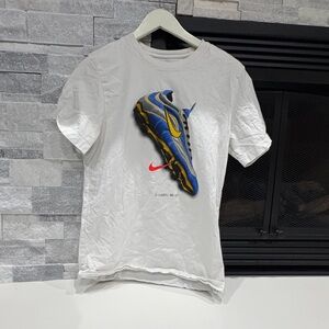Nike White Tee with Blue and Yellow Shoe Design